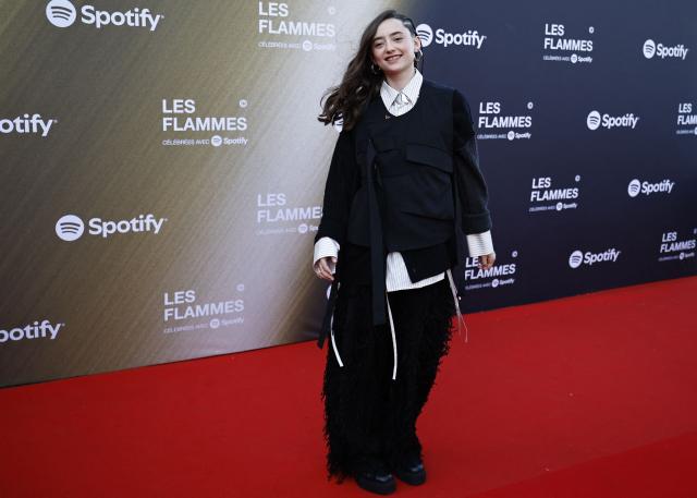 French rapper 2L poses for a photocall upon arrival for the fourth edition of "Les Flammes" music award ceremony at the Seine Musicale, in Boulogne-Billancourt, in the western outskirts of Paris on April 23, 2026. (Photo by SIMON WOHLFAHRT / AFP)