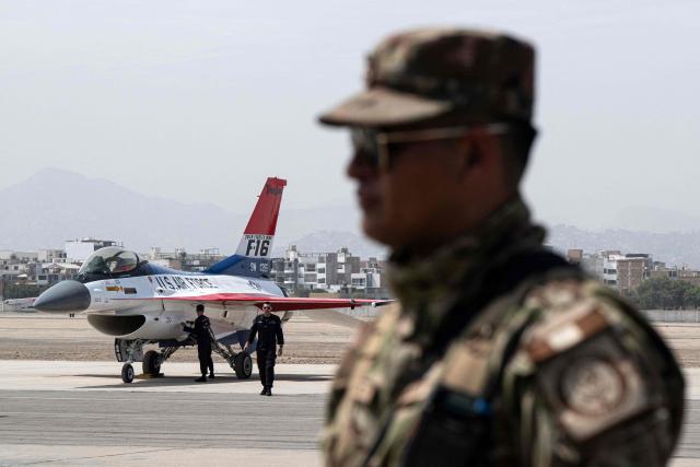 A US Air Force F-16 fighter jet is pictured on the runway of Las Palmas air base in Lima on April 23, 2026. US defense group Lockheed Martin on Thursday confirmed the purchase by Peru of 12 F-16 fighter jets in a deal that sparked fierce divisions within Peru's government on April 23, 2026. (Photo by ERNESTO BENAVIDES / AFP)
