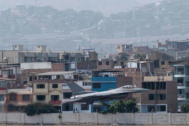 rA F-16 fighter jet performs training maneuvers over Las Palmas air base in Lima on April 23, 2026. US defense group Lockheed Martin on Thursday confirmed the purchase by Peru of 12 F-16 fighter jets in a deal that sparked fierce divisions within Peru's government on April 23, 2026. (Photo by ERNESTO BENAVIDES / AFP)