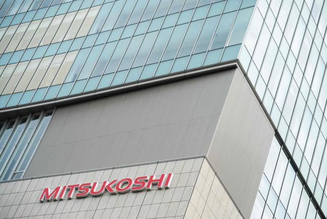 A Mitsukoshi luxury department store logo is seen on the side of a building in Ginza area of Tokyo on April 24, 2026. (Photo by Andrew CABALLERO-REYNOLDS / AFP)