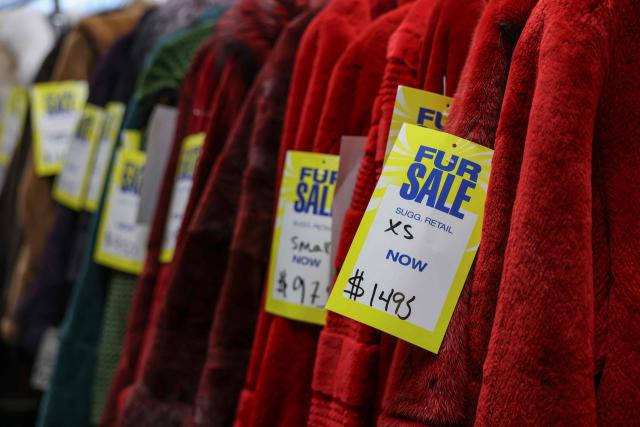 Fur coats hang for sale at the Madison Avenue Furs shop in New York City, on March 10, 2026. New York is thawing out after a particularly cruel winter that's included debates over fur's revival as influencers push the look and retail sites report a jump in searches for vintage pieces. Business owners like Larry Cowit, who inherited and runs his family's Madison Avenue Furs, are celebrating a sales spike. (Photo by ANGELA WEISS / AFP)