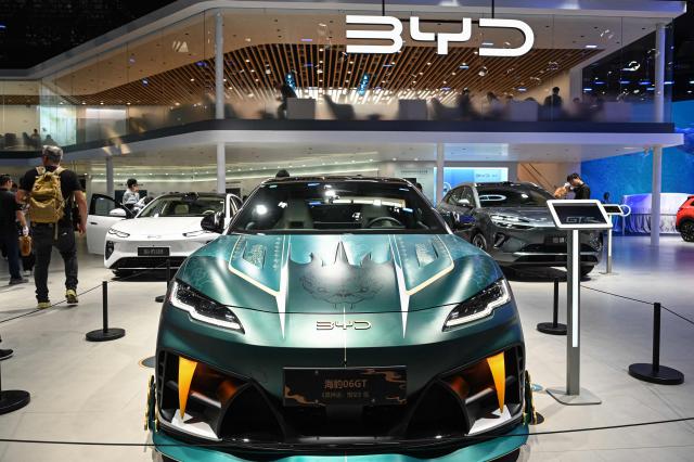 BYD's Seal 06 GT model car is displayed at the Beijing Auto Show in Beijing on April 24, 2026. (Photo by JADE GAO / AFP)
