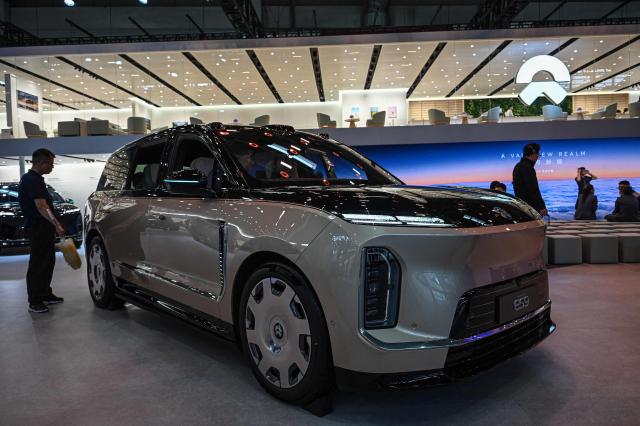 A NIO ES9 model car is displayed at the Beijing Auto Show in Beijing on April 24, 2026. (Photo by JADE GAO / AFP)