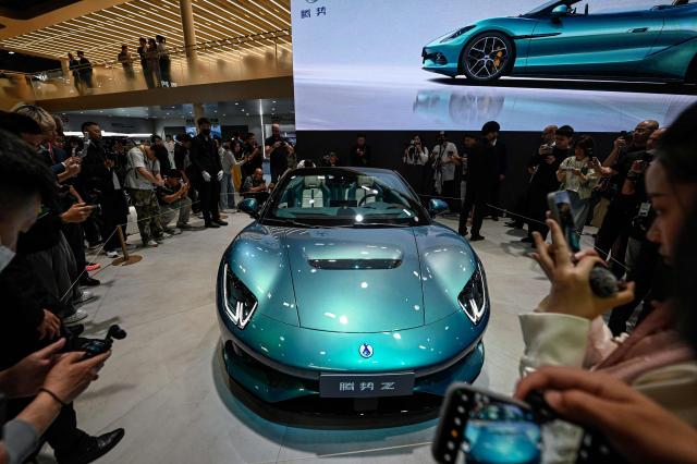 BYD-owned premium brand Denza Z model car is displayed at the Beijing Auto Show in Beijing on April 24, 2026. (Photo by JADE GAO / AFP)