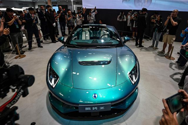 BYD-owned premium brand Denza Z model car is displayed at the Beijing Auto Show in Beijing on April 24, 2026. (Photo by JADE GAO / AFP)