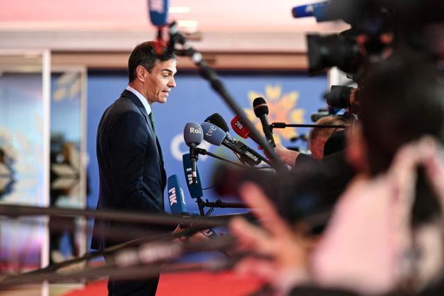 Spain's Prime Minister Pedro Sanchez speaks to journalists as he arrives for an informal meeting of the European Council in Nicosia on April 24, 2026. (Photo by NICOLAS TUCAT / AFP)