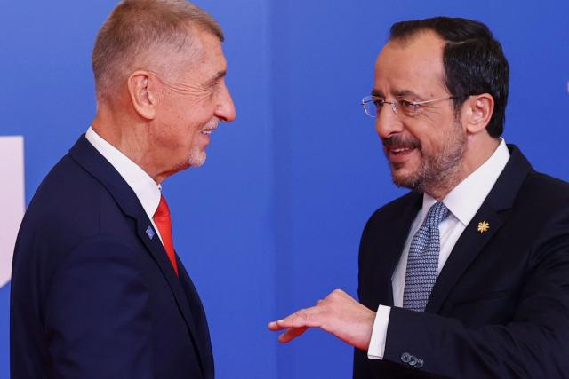 Cyprus' President Nikos Christodoulides (R) welcomes Czech Republic's Prime Minister Andrej Babis ahead of an informal meeting of the European Council in Nicosia on April 24, 2026. (Photo by Yves Herman / POOL / AFP)