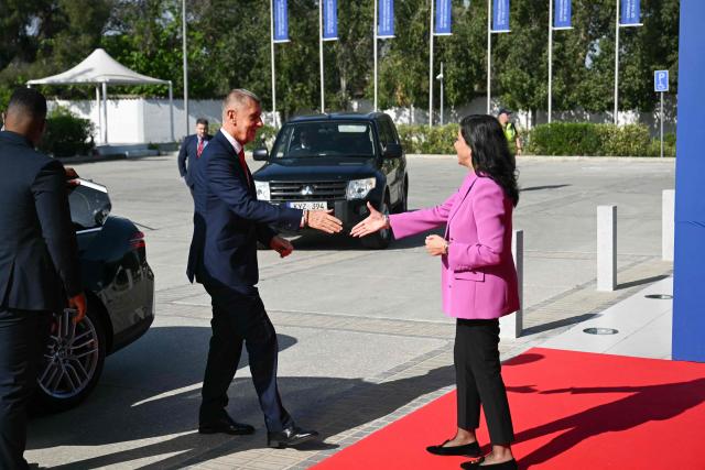 Czech Prime Minister Andrej Babis (L) arrives for an informal meeting of the European Council in Nicosia on April 24, 2026. (Photo by NICOLAS TUCAT / AFP)