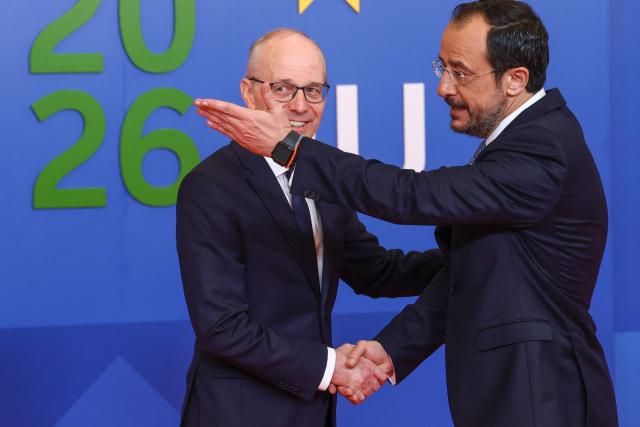 Cyprus' President Nikos Christodoulides (R) welcomes Luxembourg's Prime Minister Luc Frieden ahead of an informal meeting of the European Council in Nicosia on April 24, 2026. (Photo by Yves Herman / POOL / AFP)