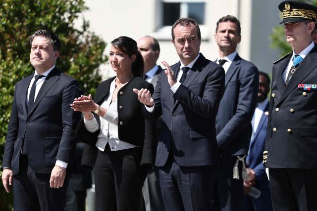 LtoR, Mayor of Marseille Benoit Payan, France's junior Minister for Education Sabrina Agresti-Roubache, France's Prime Minister Sebastien Lecornu and Prefect of the Provence-Alpes Cote d'Azur region Jacques Witkowski attend a commemoration ceremony marking the 111th anniversary of the World War I-era mass killings of Armenians under the Ottoman Empire in 1915, at the "Memorial du Genocide" in Marseille, southeastern France, on April 24, 2026. (Photo by Thibaud MORITZ / AFP)