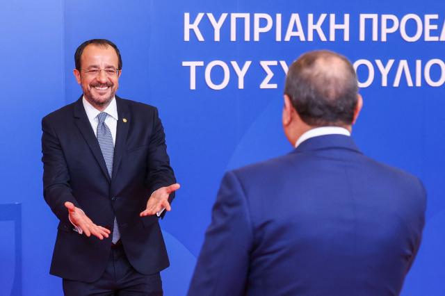 Cyprus' President Nikos Christodoulides (L) welcomes Egypt's President Abdel Fattah al-Sisi in Nicosia on April 24, 2026, on the sidelines of a European summit. European leaders vowed on April 24 to do more to de-escalate conflicts in the Middle East, as they prepared for discussions with regional counterparts from Egypt, Lebanon and Syria in Cyprus. (Photo by Yves Herman / POOL / AFP)