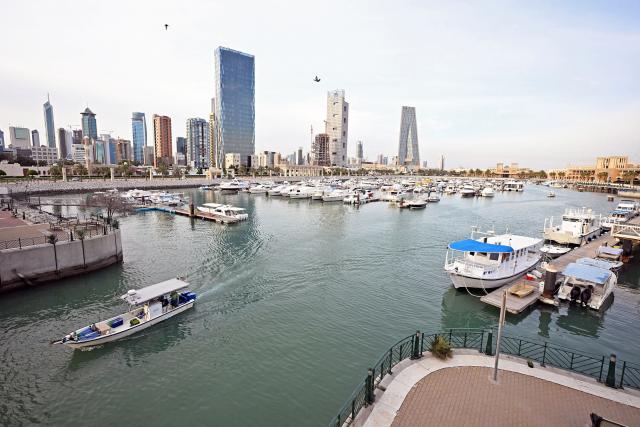 Boats moored in Souq Sharq harbour in Kuwait City on April 24, 2026. Kuwait's Interior Ministry has allowed fishing boats and recreational vessels to resume sailing between 6:00 am and 6:00 pm, following a suspension since the start of regional tensions linked to the US–Iran conflict. (Photo by YASSER AL-ZAYYAT / AFP)