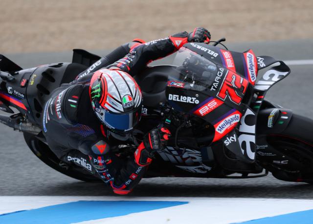 Team Aprilia Racing's Marco Bezzecchi takes a curve during a practice session of the MotoGP Spanish Grand Prix at the Jerez racetrack in Jerez de la Frontera, on April 24, 2026. (Photo by Pierre-Philippe MARCOU / AFP)