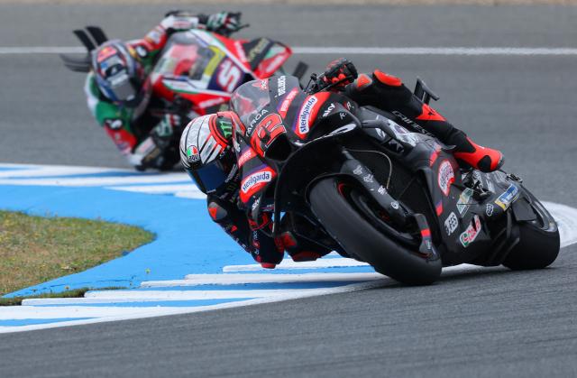 Team Aprilia Racing's Marco Bezzecchi takes a curve during a practice session of the MotoGP Spanish Grand Prix at the Jerez racetrack in Jerez de la Frontera, on April 24, 2026. (Photo by Pierre-Philippe MARCOU / AFP)