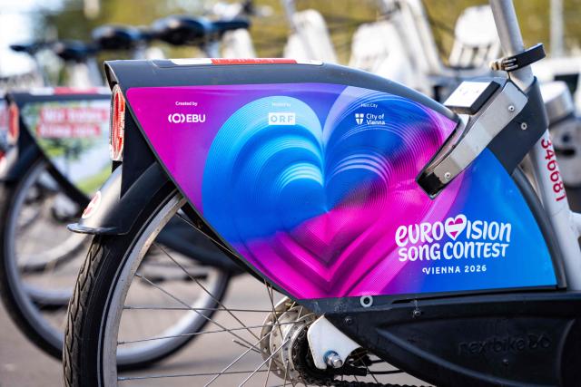 This picture shows an advertisement for the Eurovision Song Contest (ESC) on a 'WienMobile' bike, on April 24, 2026, in Vienna, Austria. The Austrian capital Vienna will host the Eurovision Song Contest 2026 from May 12 to 16, 2026. (Photo by MAX HERBST / APA / AFP) / Austria OUT
