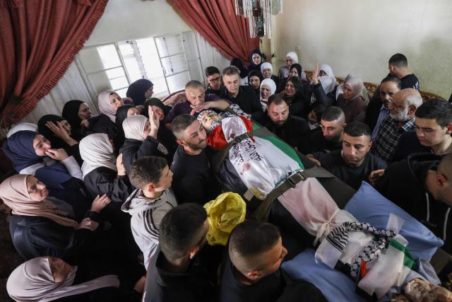 EDITORS NOTE: Graphic content / Mourners carry the body of 15-year-old Youssef Sameh Shtayyeh during his funeral in the village of Till, west of Nablus, in the Israeli-occupied West Bank, on April 24, 2026. Israeli troops killed a teenage boy during a raid in the occupied West Bank city of Nablus on April 23, the Palestinian health ministry said, with the Israeli military saying forces fired at a stone thrower. (Photo by JAAFAR ASHTIYEH / AFP)