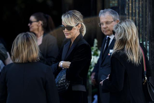 Former French model Laeticia Hallyday arrives for the funeral ceremony of French actress Nadia Fares at the Saint-Jean de Montmartre church in Paris on April 24, 2026. Nadia Fares died on April 17, 2026, aged 57, after being found unconscious in a swimming pool in Paris and several days in a coma. (Photo by SIMON WOHLFAHRT / AFP)