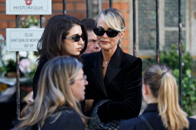 Former French model Laeticia Hallyday arrives for the funeral ceremony of French actress Nadia Fares at the Saint-Jean de Montmartre church in Paris on April 24, 2026. Nadia Fares died on April 17, 2026, aged 57, after being found unconscious in a swimming pool in Paris and several days in a coma. (Photo by SIMON WOHLFAHRT / AFP)