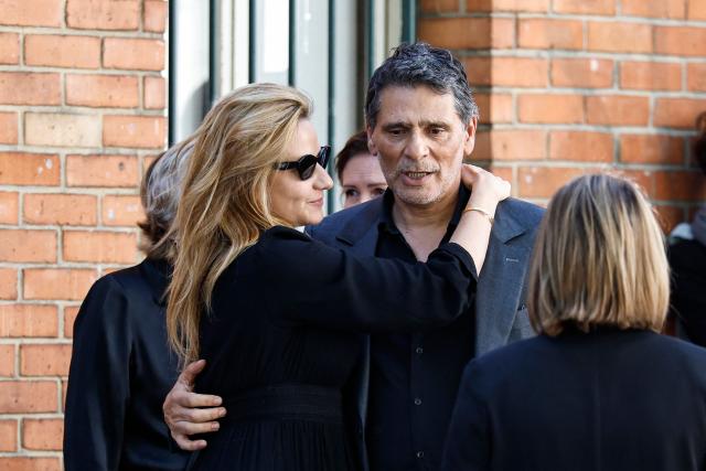 French actor Pascal Elbe (R) arrives for the funeral ceremony of French actress Nadia Fares at the Saint-Jean de Montmartre church in Paris on April 24, 2026. Nadia Fares died on April 17, 2026, aged 57, after being found unconscious in a swimming pool in Paris and several days in a coma. (Photo by SIMON WOHLFAHRT / AFP)