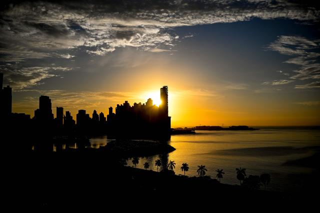 The sun rises over the city skyline in Panama City on April 24, 2026. (Photo by MARTIN BERNETTI / AFP)