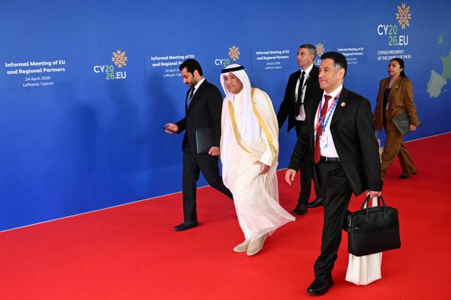 Secretary General of the six-nation Gulf Cooperaetion Council (GCC), Jasem Mohamed al-Budaiwi (C) leaves after taking part in a working session of the European Council and regional partners during an informal meeting in Nicosia on April 24, 2026. (Photo by NICOLAS TUCAT / AFP)