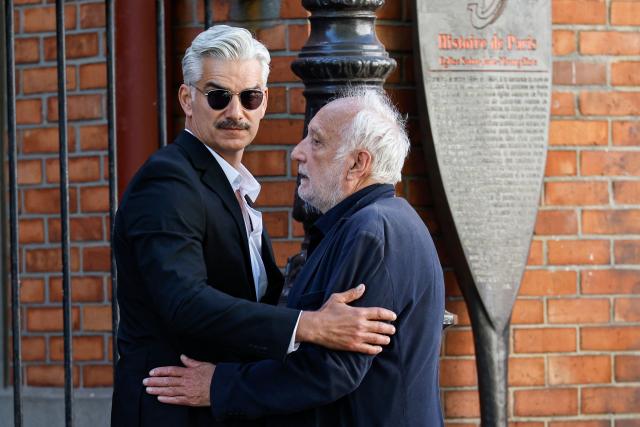 Belgian François Vincentelli and French actor Francois Berleand arrive for the funeral of French actress Nadia Fares at Saint-Jean de Montmartre church in Paris on April 24, 2026. Nadia Fares died on April 17, 2026, aged 57, after being found unconscious in a swimming pool in Paris and several days in a coma. (Photo by SIMON WOHLFAHRT / AFP)