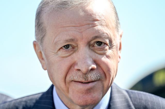 Turkey's President Recep Tayyip Erdogan looks on during an event to announce the return of the Turkish Grand Prix the Formula One calendar after a six year hiatus in 2027, Dolmabahce Palace Presidental, in Istanbul, on April 24,2026. (Photo by Ozan KOSE / AFP)