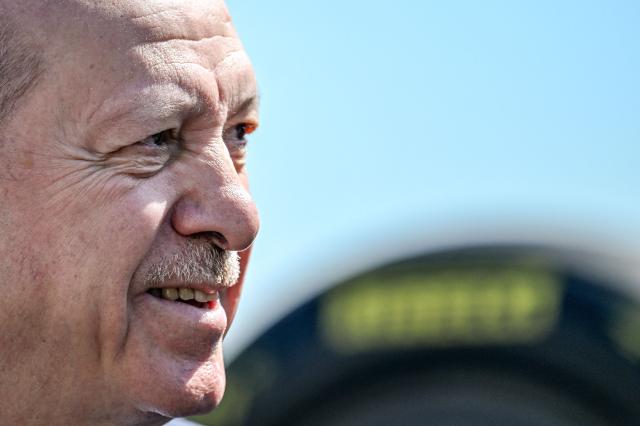 Turkey's President Recep Tayyip Erdogan looks on during an event to announce the return of the Turkish Grand Prix the Formula One calendar after a six year hiatus in 2027, Dolmabahce Palace Presidental, in Istanbul, on April 24,2026. (Photo by Ozan KOSE / AFP)