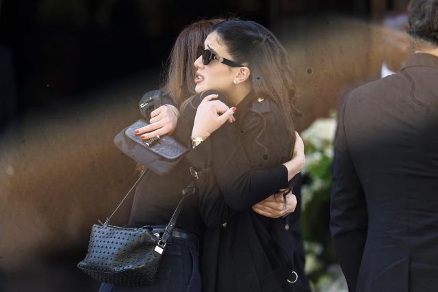 Nadia Fares' daughter Cylia Chasman arrives for the funeral ceremony of her mother at the Saint-Jean de Montmartre church in Paris on April 24, 2026. Nadia Fares died on April 17, 2026, aged 57, after being found unconscious in a swimming pool in Paris and several days in a coma. (Photo by SIMON WOHLFAHRT / AFP)