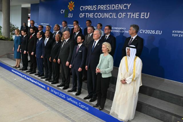 (Front row, L-R) EU High Representative and Vice-President for Foreign Affairs and Security Policy Kaja Kallas, Romania's President Nicusor Dan, Syria's President Ahmed al-Sharaa, Egypt's President Abdel Fattah al-Sisi, Cyprus' President Nikos Christodoulides, European Council President Antonio Costa, Lebanon's President Joseph Aoun, Jordan's Crown Prince Hussein bin Abdullah, Lithuania's President Gitanas Nauseda, European Commission President Ursula von der Leyen, Secretary General of the six-nation Gulf Cooperaetion Council (GCC), Jasem Mohamed al-Budaiwi; (middle row, L-R) Finland's Prime Minister Petteri Orpo,  Bulgaria's Prime Minister Andrey Gyurov, Malta's Prime Minister Robert Abela, Italy's Prime Minister Giorgia Meloni, Ireland's Prime Minister Micheal Martin, Slovakia's Prime Minister Robert Fico, Estonia's Prime Minister Kristen Michal, Croatia's Prime Minister Andrej Plenkovic; (back row, L-R) Germany's Chancellor Friedrich Merz, Belgium's Prime Minister Bart De Wever, Portugal's Prime Minister Luis Montenegro, Spain's Prime Minister Pedro Sanchez, and Denmark's Prime Minister Mette Frederiksen pose for a family photo after a working session of the European Council and regional partners as part of an informal meeting in Nicosia on April 24, 2026. (Photo by NICOLAS TUCAT / AFP)
