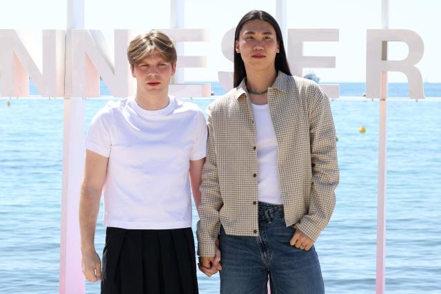 Influencers Jason Kim (L) and Hwi-hyun Kim pose during a photocall as part of the 9th edition of the Cannes International Series Festival (Canneseries) in Cannes, southern France, on April 24, 2026. (Photo by Valery HACHE / AFP)