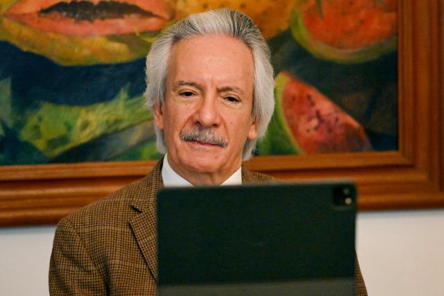 Guatemalan journalist and founder of the former newspaper "El Periodico," Jose Ruben Zamora, attends a virtual meeting with members of the Inter-American Press Association (SIP) at his home, where he is under house arrest in Guatemala City on April 24, 2026. (Photo by Johan ORDONEZ / AFP)