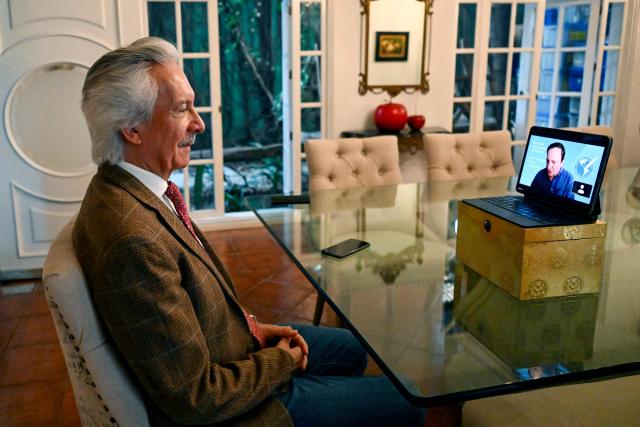 Guatemalan journalist and founder of the former newspaper "El Periodico," Jose Ruben Zamora, attends a virtual meeting with members of the Inter-American Press Association (SIP) at his home, where he is under house arrest in Guatemala City on April 24, 2026. (Photo by Johan ORDONEZ / AFP)