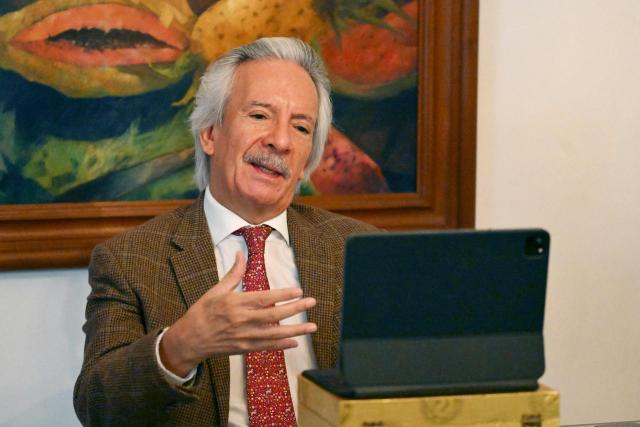 Guatemalan journalist and founder of the former newspaper "El Periodico," Jose Ruben Zamora, gestures as he speaks during a virtual meeting with members of the Inter-American Press Association (SIP) at his home, where he is under house arrest in Guatemala City on April 24, 2026. (Photo by Johan ORDONEZ / AFP)