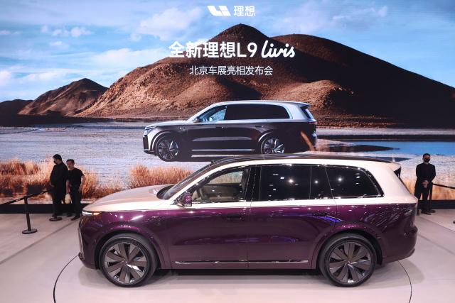 A Li Auto L9 Livis is displayed on the opening day of the Beijing Auto Show in Beijing on April 24, 2026. (Photo by CN-STR / AFP) / China OUT
