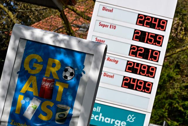 The fuel prices are on display at a gas station in Berlin on April 24, 2026. Oil and natural gas prices have surged since the end of February 2026, when the United States and Israel began attacking Iran, plunging the Middle East into turmoil. (Photo by Tobias SCHWARZ / AFP)