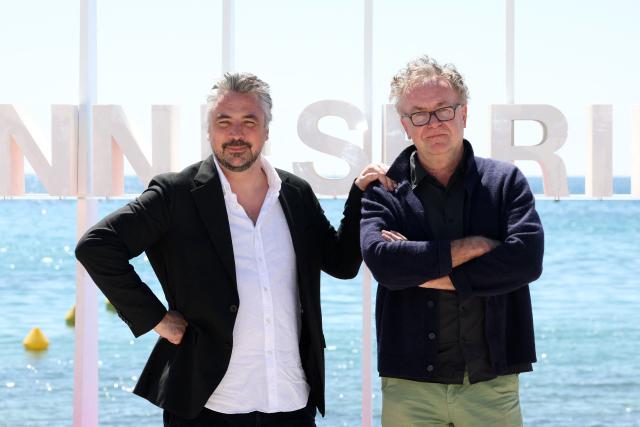 Danish director Andreas Dalsgaard (L) and co-director, producer and scenarist Christoph Jorg pose during the "The Oligarch and the Art Dealer" photocall as part of the 9th edition of the Cannes International Series Festival (Canneseries) in Cannes, southern France, on April 24, 2026. (Photo by Valery HACHE / AFP)