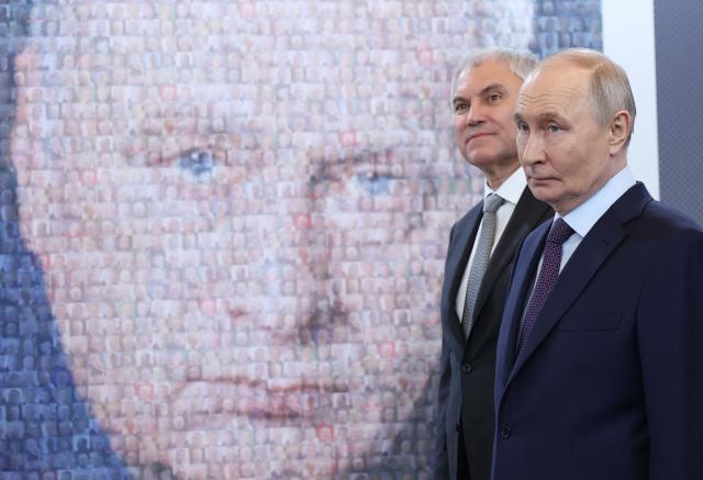 In this pool photograph distributed by the Russian state agency Sputnik, Russia's President Vladimir Putin, accompanied by Russian State Duma Speaker Vyacheslav Volodin, visits an exhibition dedicated to the late leader of the Liberal Democratic Party of Russia (LDPR) Vladimir Zhirinovsky in Moscow on April 24, 2026. (Photo by Valery SHARIFULIN / POOL / AFP)