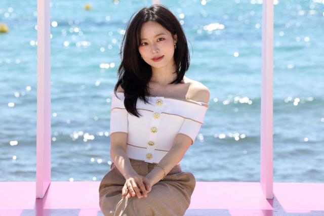 South-Korean actress Yoon Kyoung Bae poses during the "Genfluencer" photocall as part of the 9th edition of the Cannes International Series Festival (Canneseries) in Cannes, southern France, on April 24, 2026. (Photo by Valery HACHE / AFP)