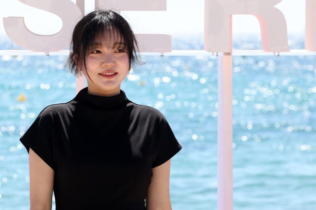 Actress Jiin Moon poses during the "Genfluencer" photocall as part of the 9th edition of the Cannes International Series Festival (Canneseries) in Cannes, southern France, on April 24, 2026. (Photo by Valery HACHE / AFP)