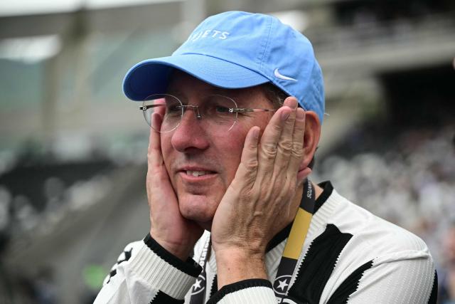 (FILES) Botafogo owner and CEO John Textor gestures before the start of the Brasileirao Seria A football match between Botafogo and Sao Paulo at the Nilton Santos Olympic stadium in Rio de Janeiro, Brazil, on December 8, 2024. The Rio de Janeiro football club announced on April 24, 2026, that U.S. business magnate John Textor had been removed from Botafogo’s management by a Brazilian arbitration court. (Photo by Mauro PIMENTEL / AFP)