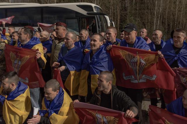 Released Ukrainian prisoners of war (POWs) gather for a group photograph following a prisoner exchange at an undisclosed location, in the Chernihiv region on April 24, 2026, amid the Russian invasion of Ukraine. Russia and Ukrain swapped 193 captured soldiers each, the second exchange this month in one of the few areas of cooperation between Moscow and Kyiv. The two countries have exchanged thousands of POWs throughout the four-year war -- with the swaps often the only result of otherwise stalled talks on ending the conflict. (Photo by Roman PILIPEY / AFP)