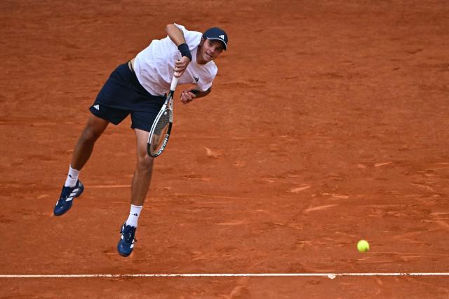 Spain's Rafael Jodar serves a shot to Australia's Alex De Minaur during their 2026 ATP Tour Madrid Open tennis tournament second round singles match at the Caja Magica in Madrid, on April 24, 2026. (Photo by Javier SORIANO / AFP)