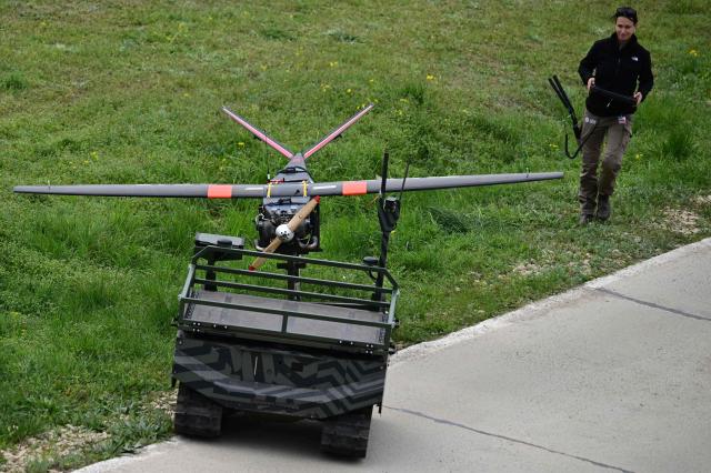 Military equipment from private enterprises are used in Exercise EASTERN PHOENIX 26, a training activity designed to test counter-unmanned aircraft systems (C-UAS) procedures, at Capu Midia firing range, April 24, 2026. The exercise, which includes NATO’s first "Crucible Series" event, aims to strengthen national defense and NATO’s Eastern Flank by integrating kinetic and non-kinetic responses to airspace incursions with special interest in the testing of anti-drones measures. Participants included aproximately 250 Romanian military personnel and 250 industry representatives from 21 NATO allied nations . (Photo by Daniel MIHAILESCU / AFP)
