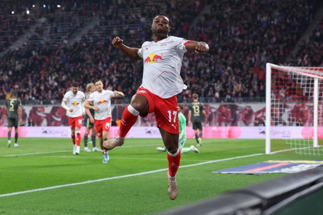 Leipzig's German midfielder #17 Ridle Baku celebrates scoring the 3-0 goal with his teammates during the German first division Bundesliga football match between RB Leipzig and Union Berlin in Leipzig, eastern Germany, on April 24, 2026. (Photo by Ronny HARTMANN / AFP) / DFL REGULATIONS PROHIBIT ANY USE OF PHOTOGRAPHS AS IMAGE SEQUENCES AND/OR QUASI-VIDEO
