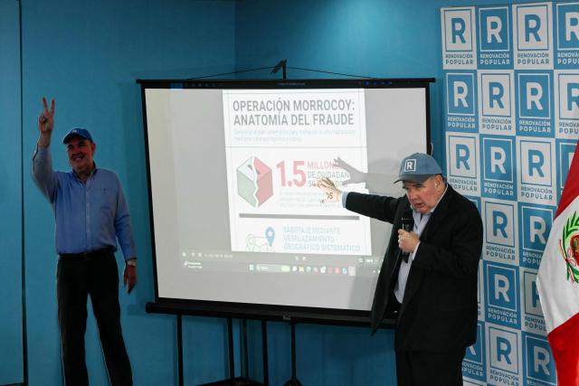 Peru’s presidential candidate for the Renovacion Popular party, Rafael Lopez Aliaga, speaks during a press conference at their campaign headquarters in Lima on April 24, 2026. (Photo by ERNESTO BENAVIDES / AFP)