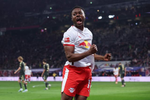 Leipzig's German midfielder #17 Ridle Baku celebrates scoring the 3-0 goal during the German first division Bundesliga football match between RB Leipzig and Union Berlin in Leipzig, eastern Germany, on April 24, 2026. (Photo by Ronny HARTMANN / AFP) / DFL REGULATIONS PROHIBIT ANY USE OF PHOTOGRAPHS AS IMAGE SEQUENCES AND/OR QUASI-VIDEO
