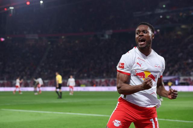 Leipzig's German midfielder #17 Ridle Baku celebrates scoring the 3-0 goal during the German first division Bundesliga football match between RB Leipzig and Union Berlin in Leipzig, eastern Germany, on April 24, 2026. (Photo by Ronny HARTMANN / AFP) / DFL REGULATIONS PROHIBIT ANY USE OF PHOTOGRAPHS AS IMAGE SEQUENCES AND/OR QUASI-VIDEO