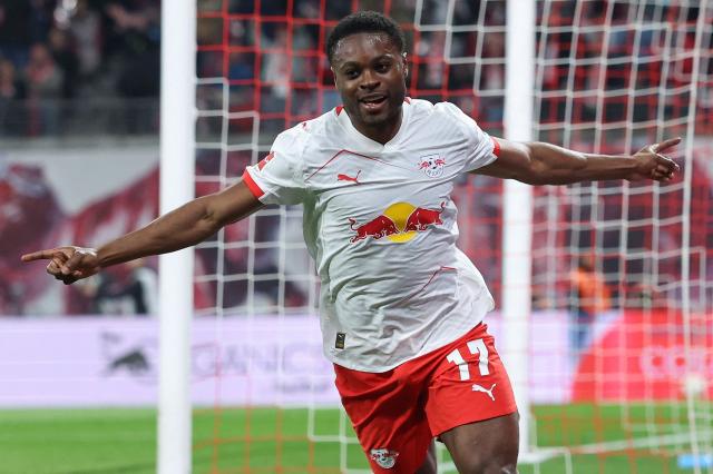 Leipzig's German midfielder #17 Ridle Baku celebrates scoring the 3-0 goal during the German first division Bundesliga football match between RB Leipzig and Union Berlin in Leipzig, eastern Germany, on April 24, 2026. (Photo by Ronny HARTMANN / AFP) / DFL REGULATIONS PROHIBIT ANY USE OF PHOTOGRAPHS AS IMAGE SEQUENCES AND/OR QUASI-VIDEO  ALTERNATIVE CROP