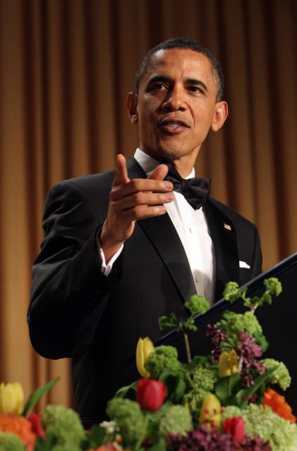 (FILES) US President Barack Obama speaks at the White House Correspondents' Association annual dinner in Washington DC, April 30, 2011. President Obama roasted Donald Trump about his presidential qualifications during the dinner. US President Donald Trump plans on attending the 2026 White House Correspondents' dinner, the first of his presidency. (Photo by CHRIS KLEPONIS / AFP)